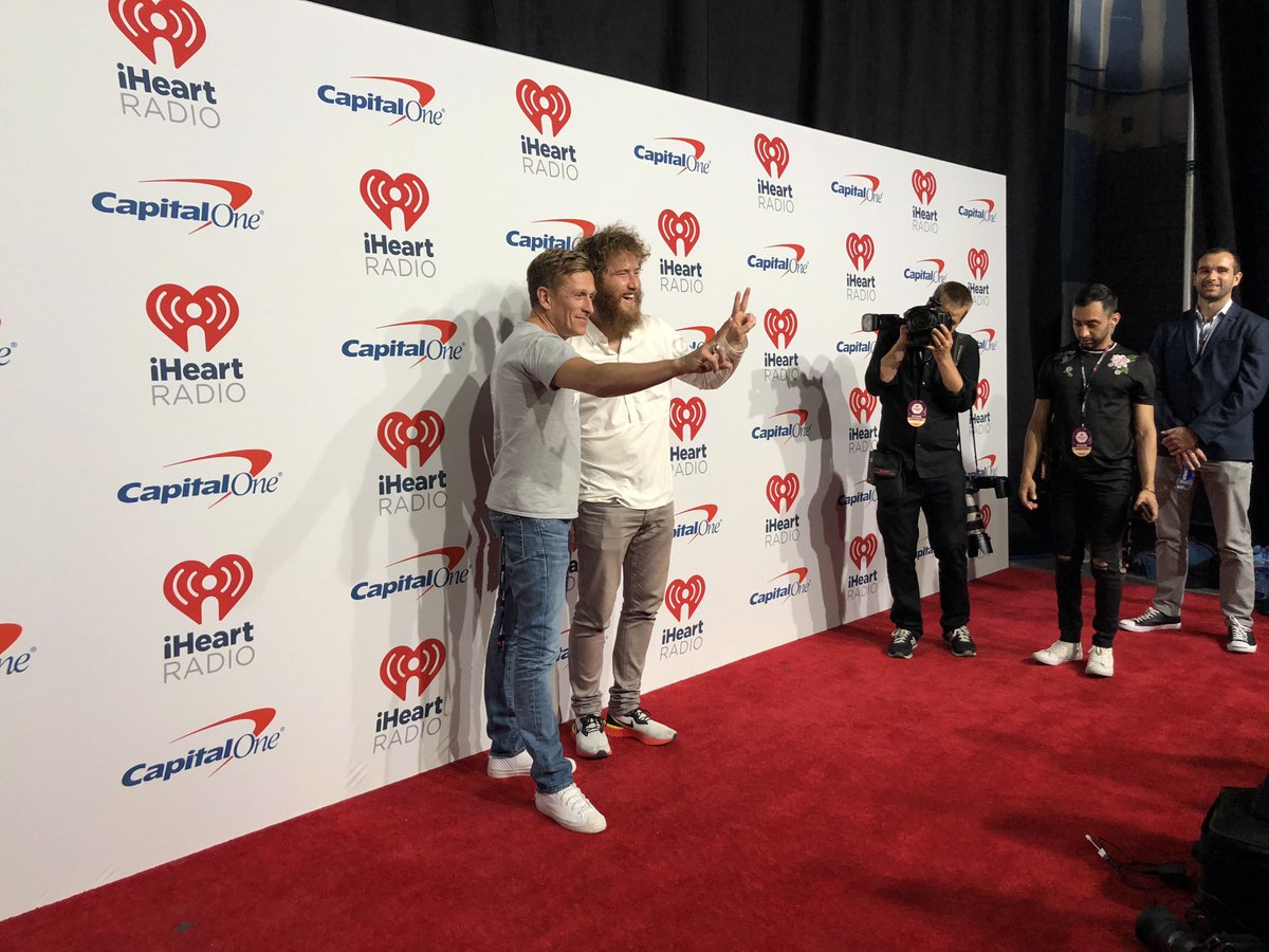 Jeremy Gilley and Mike Posner at iHeartRadio Music Festival to raise awareness of Peace Day on September 21, 2018
