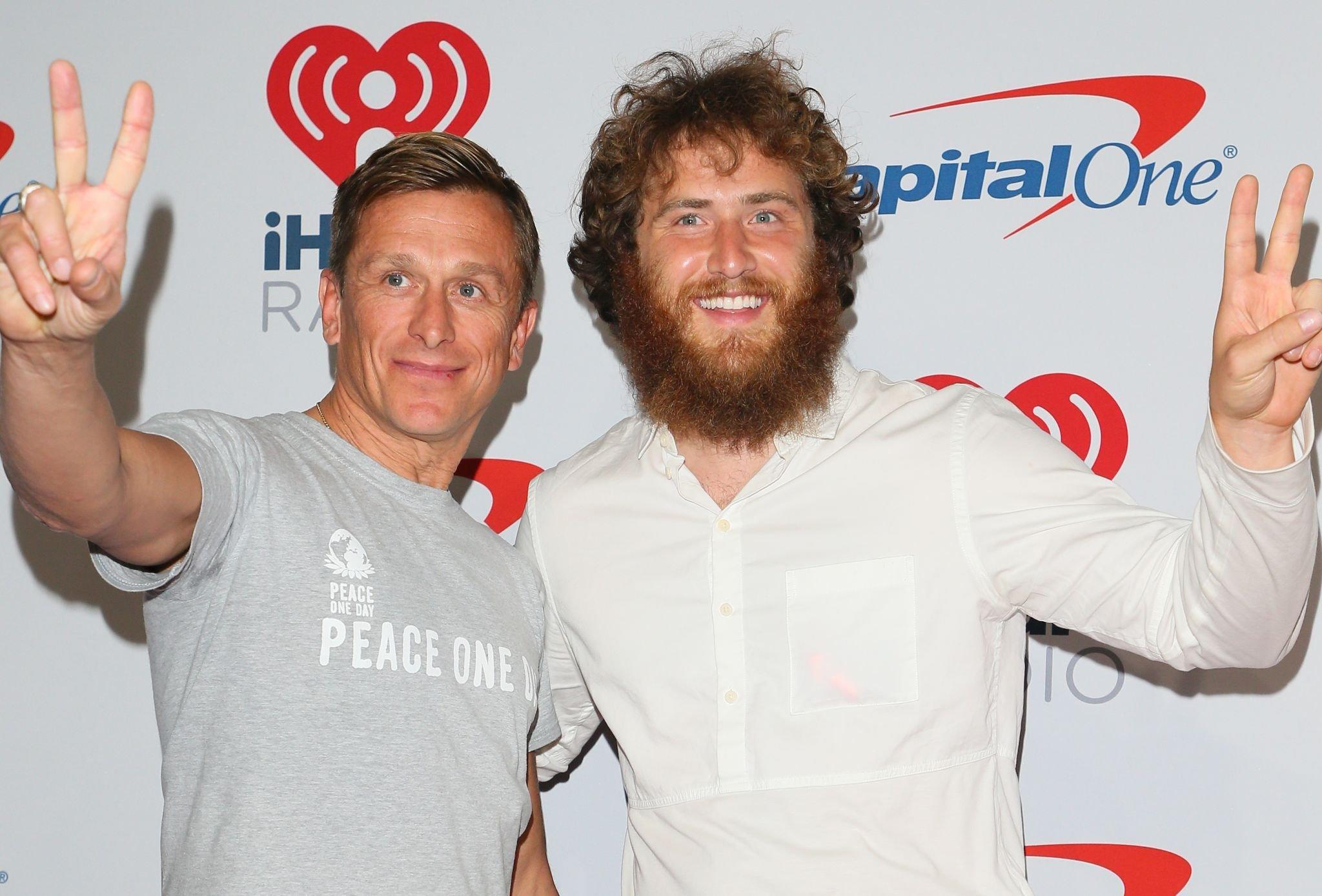 Jeremy Gilley and Mike Posner at iHeartRadio Music Festival to raise awareness of Peace Day on September 21, 2018
