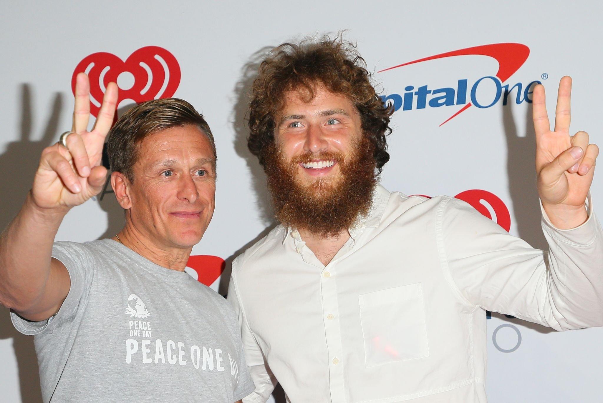 Jeremy Gilley and Mike Posner at iHeartRadio Music Festival to raise awareness of Peace Day on September 21, 2018
