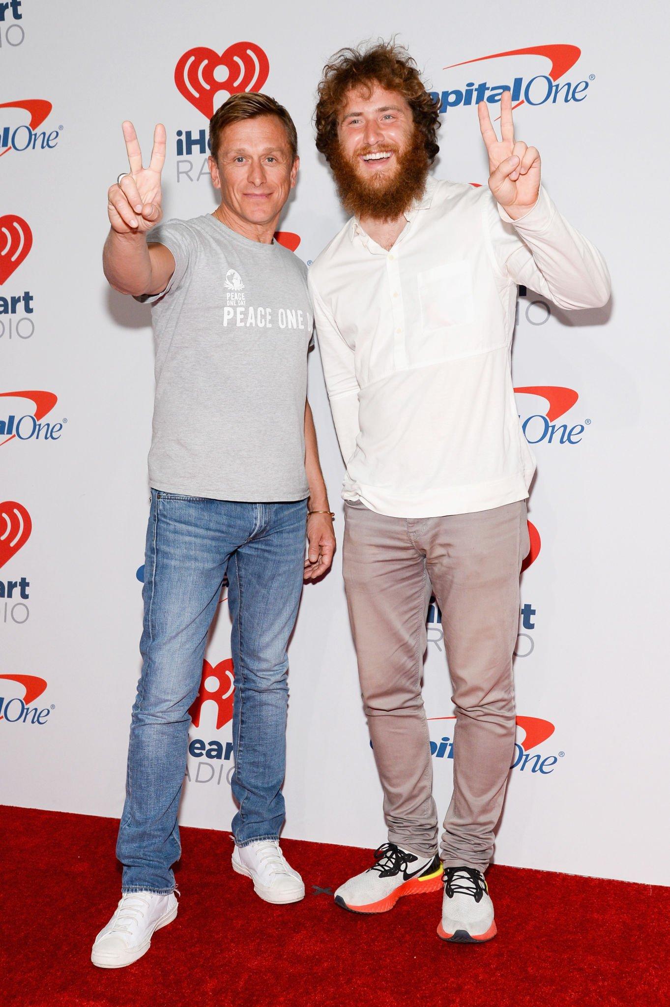 Jeremy Gilley and Mike Posner at iHeartRadio Music Festival to raise awareness of Peace Day on September 21, 2018
