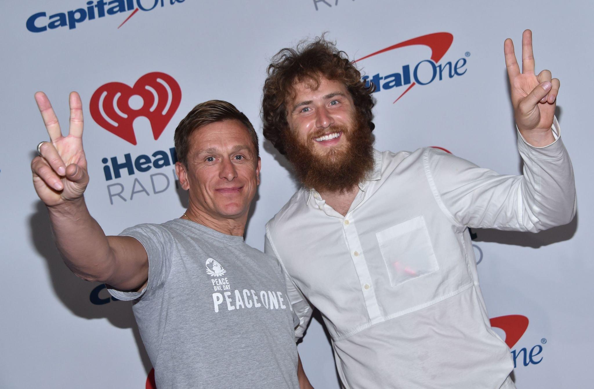 Jeremy Gilley and Mike Posner at iHeartRadio Music Festival to raise awareness of Peace Day on September 21, 2018
