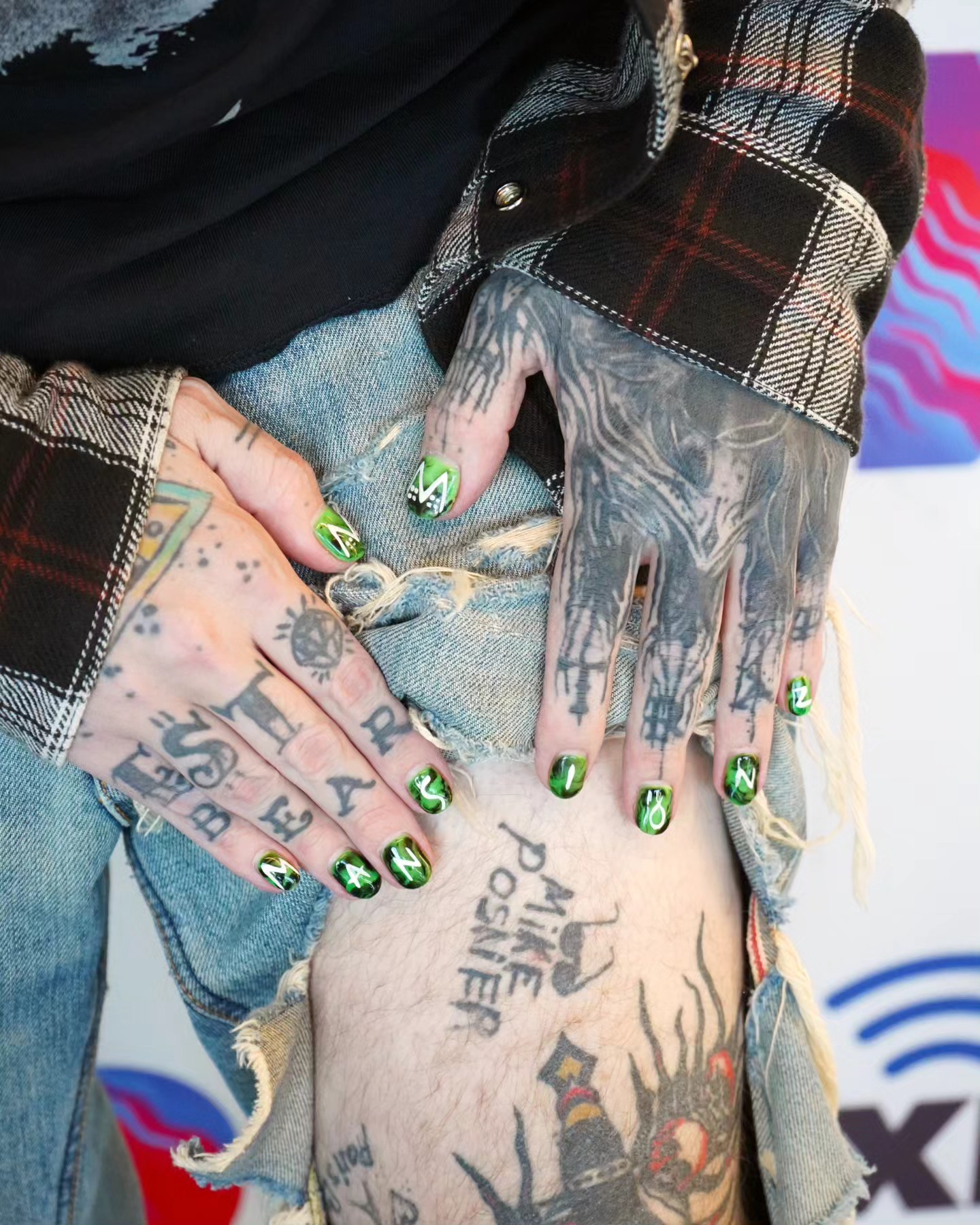 blackbear showing off his Mike Posner tattoo at SiriusXM Hits 1.
