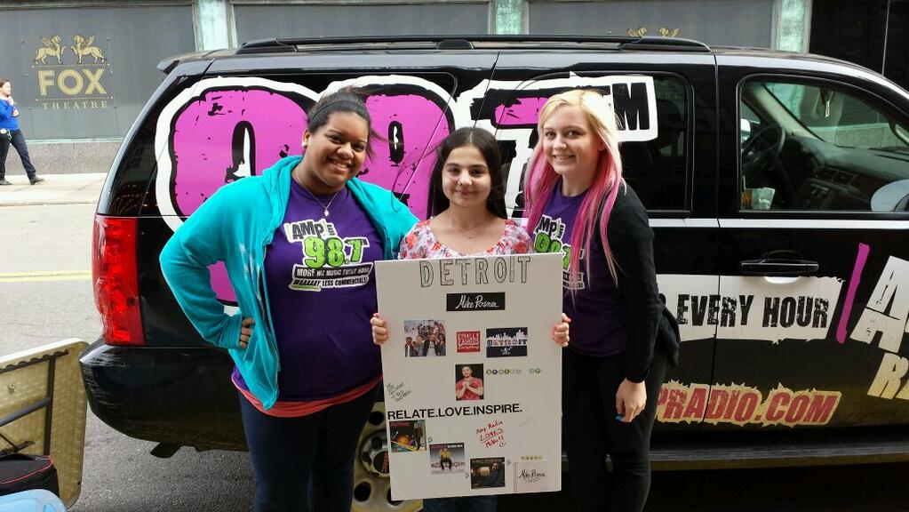 Angel with the poster she made for Mike Posner.