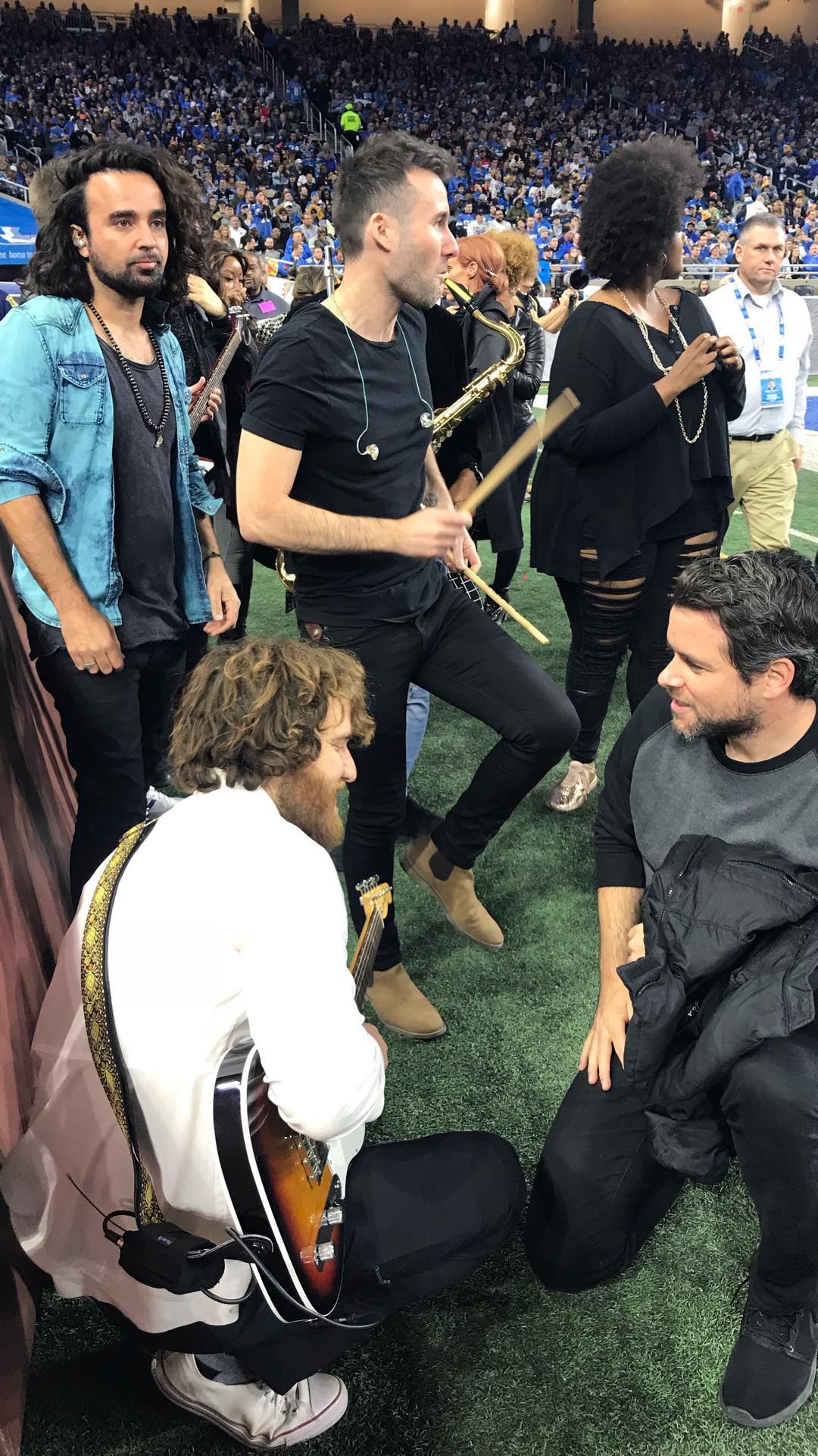 Mike Posner and band members at Ford Field before performing the halftime show
Photo credit: Ryan Chisholm
