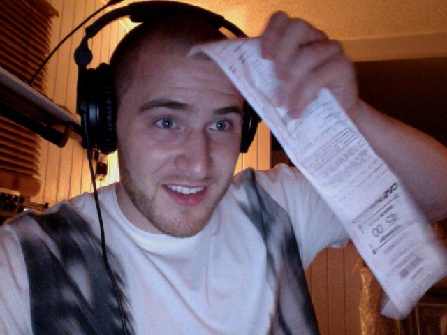 Mike Posner with long CVS receipt 7/3/11
