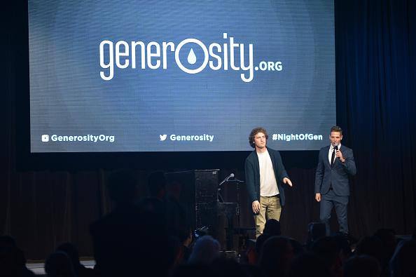 Mike Posner and Jason Kennedy at The 6th Annual Night Of Generosity at the Beverly Wilshire Hotel in Beverly Hills, CA December 5, 2014
