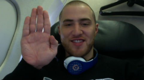 Mike Posner in a plane headed to Grand Rapids, MI 7/13/11
Mittens Up!
