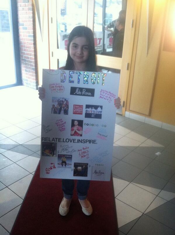 Angel with the poster she made for Mike Posner.