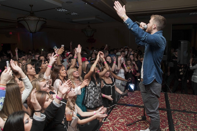 Mike Posner performing at Singles Mingle Pajama Party in Troy, MI 2/7/14
mojointhemorning.com
