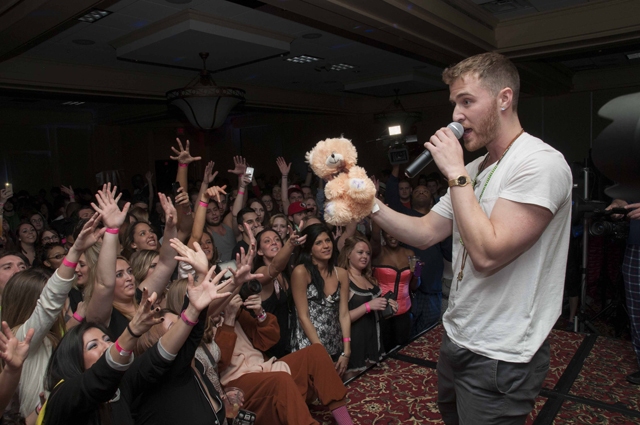 Mike Posner performing at Singles Mingle Pajama Party in Troy, MI 2/7/14
mojointhemorning.com
