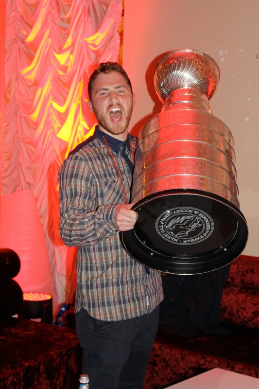 Mike Posner holding the NHL Stanley Cup in Sochi, Russia - February 17, 2014
examiner.com
