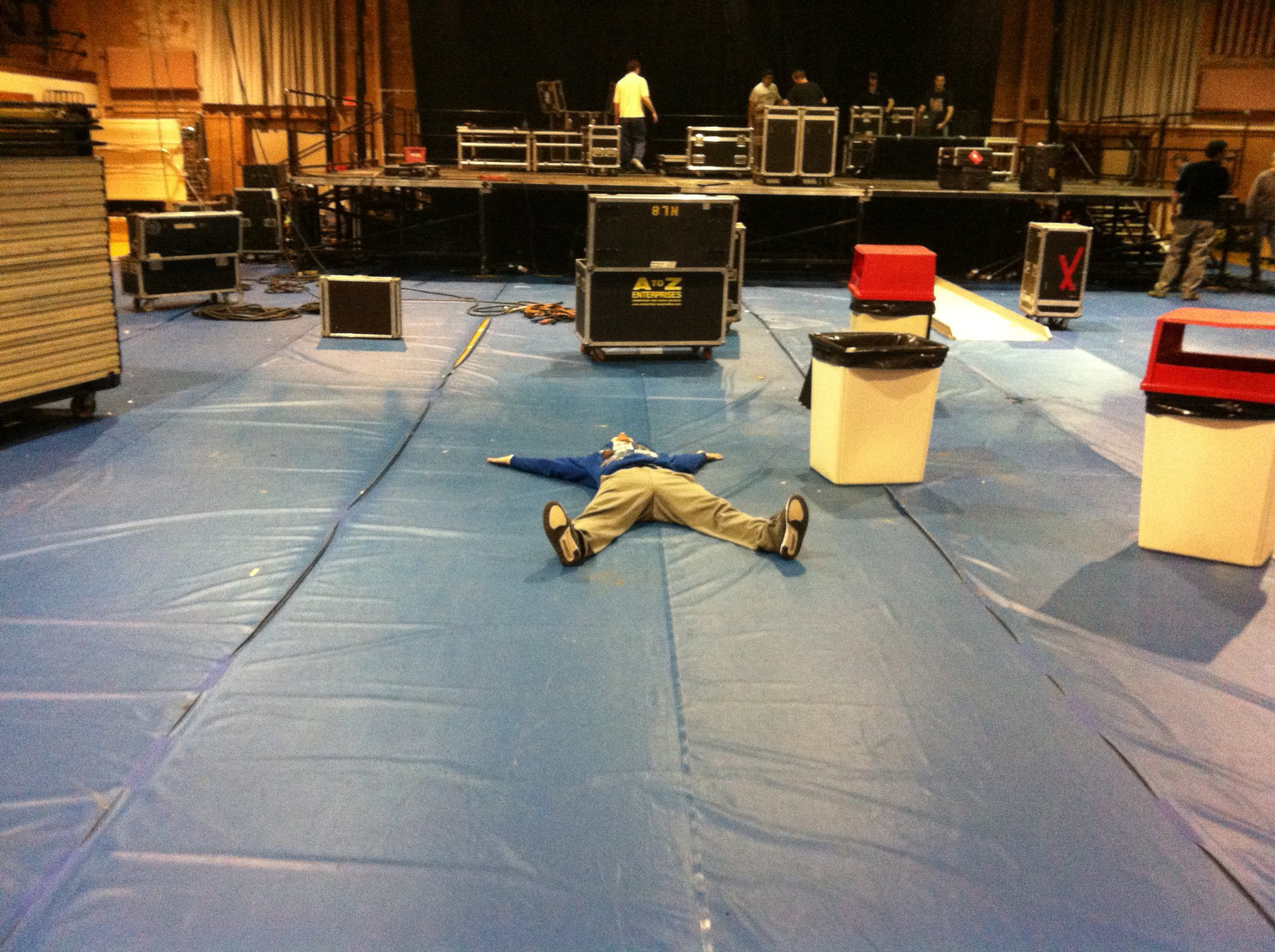 Mike lying in the crater in the floor after a show at UNI 4/21/11
