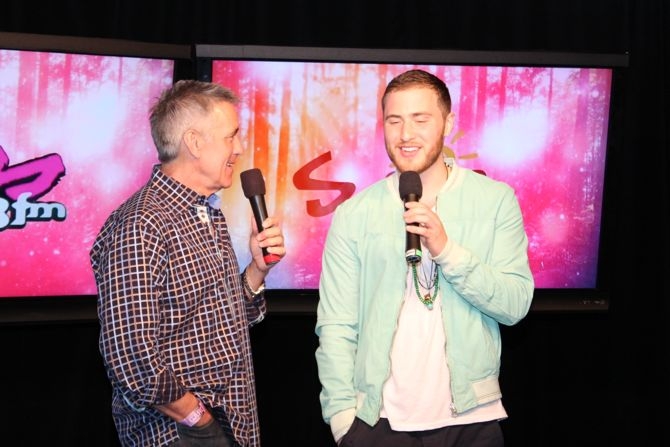 Kiss 108's Billy Costa interviews Mike Posner backstage at Kiss Concert 2013
Photo by kiss108.com
