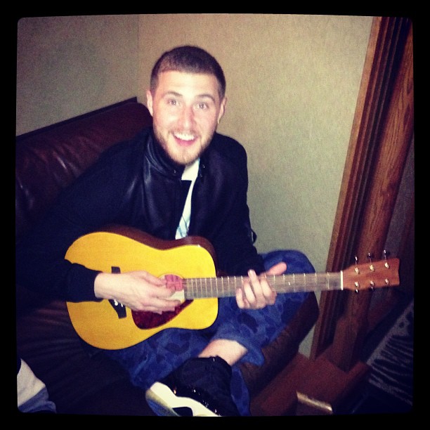 Mike Posner learning to play the guitar - San Jose, CA 6/26/13
Photo by Mike Posner
instagram.com/mikeposner
