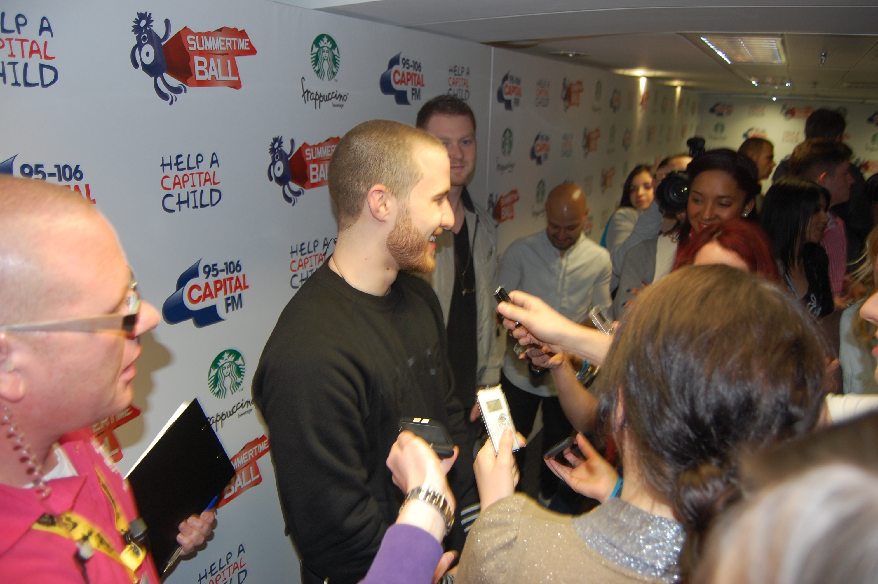 mike-posner-backstage-at-the-2011-summertime-ball-8.jpg