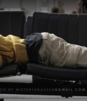 Mike-Posner-sleeping-in-airport-2011.jpg